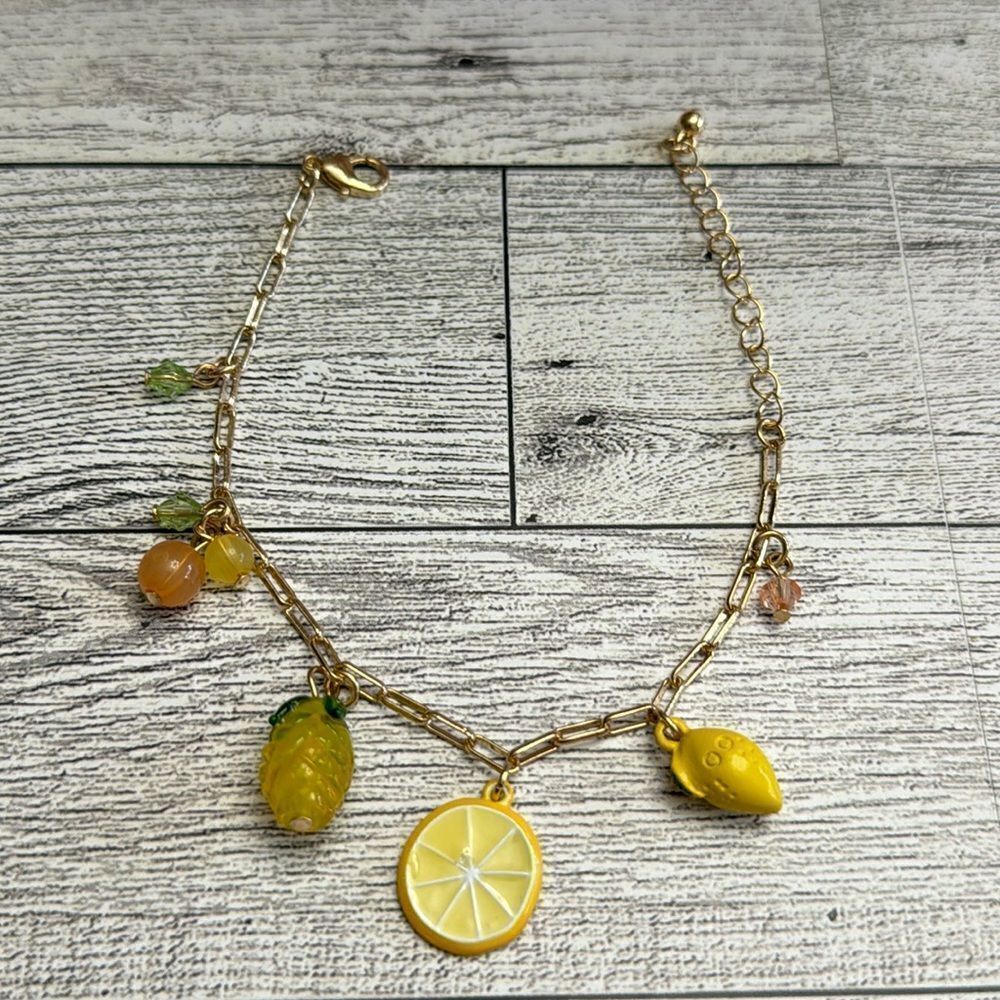 NWOT Lemon Charm Gold Tone Link Bracelet